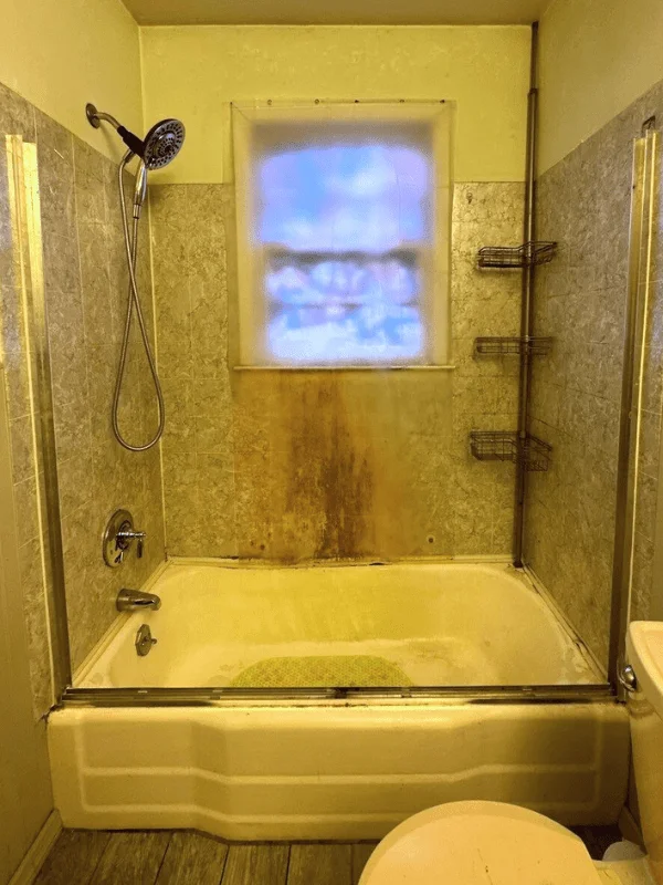 Stained, outdated bathroom
